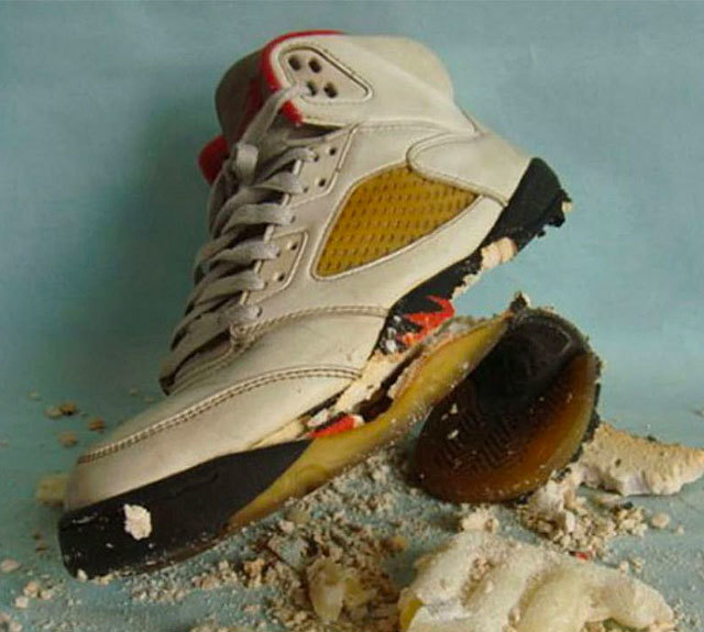 A collector sneaker with its midsole crumbled into powder