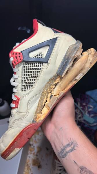 A collector sneaker degrading in storage — crumbling, yellowing foam